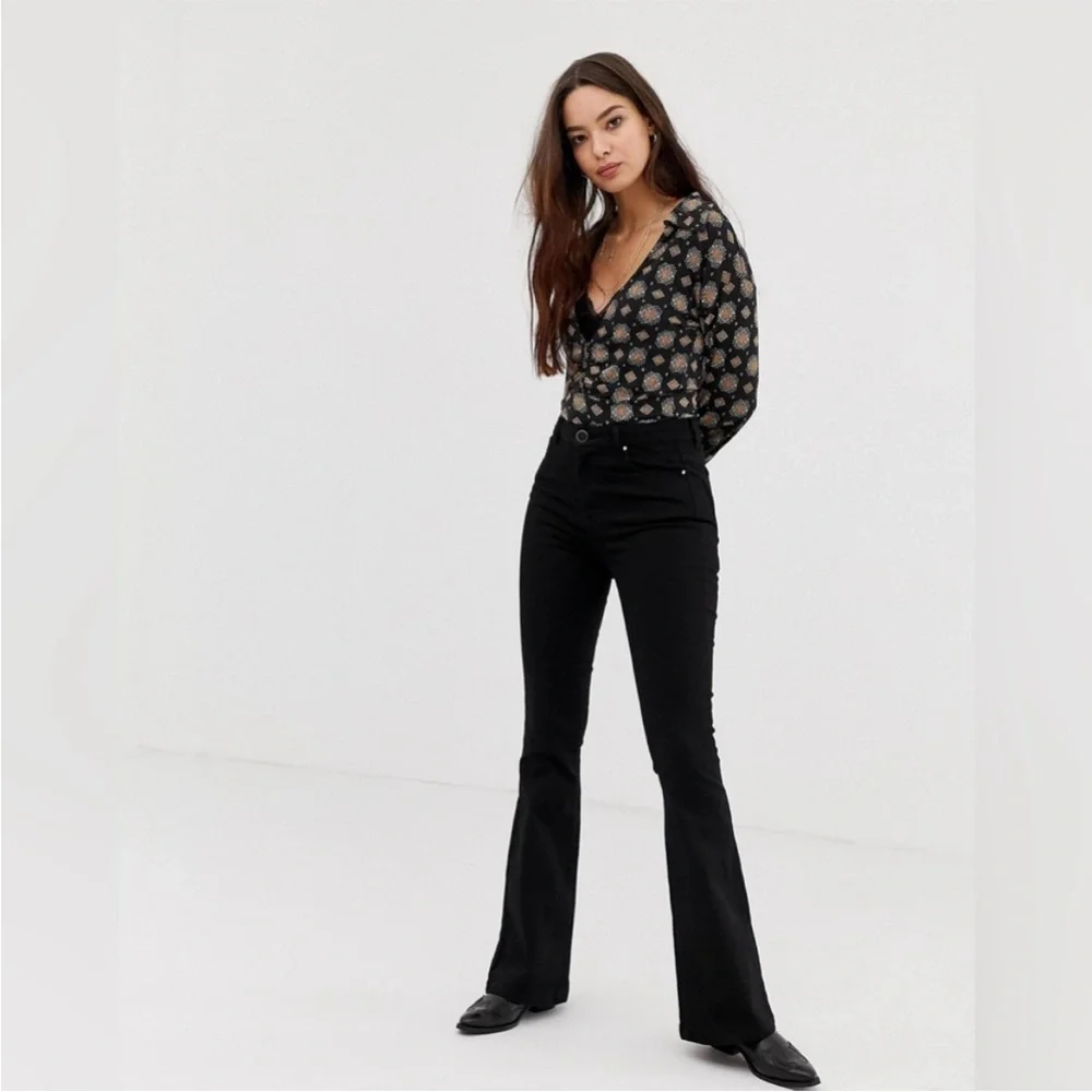 FREE PEOPLE FLATTERING PARTY TOP BOHO WASHED BLACK PRINT LONG SLEEVE LIGHTWEIGHT
